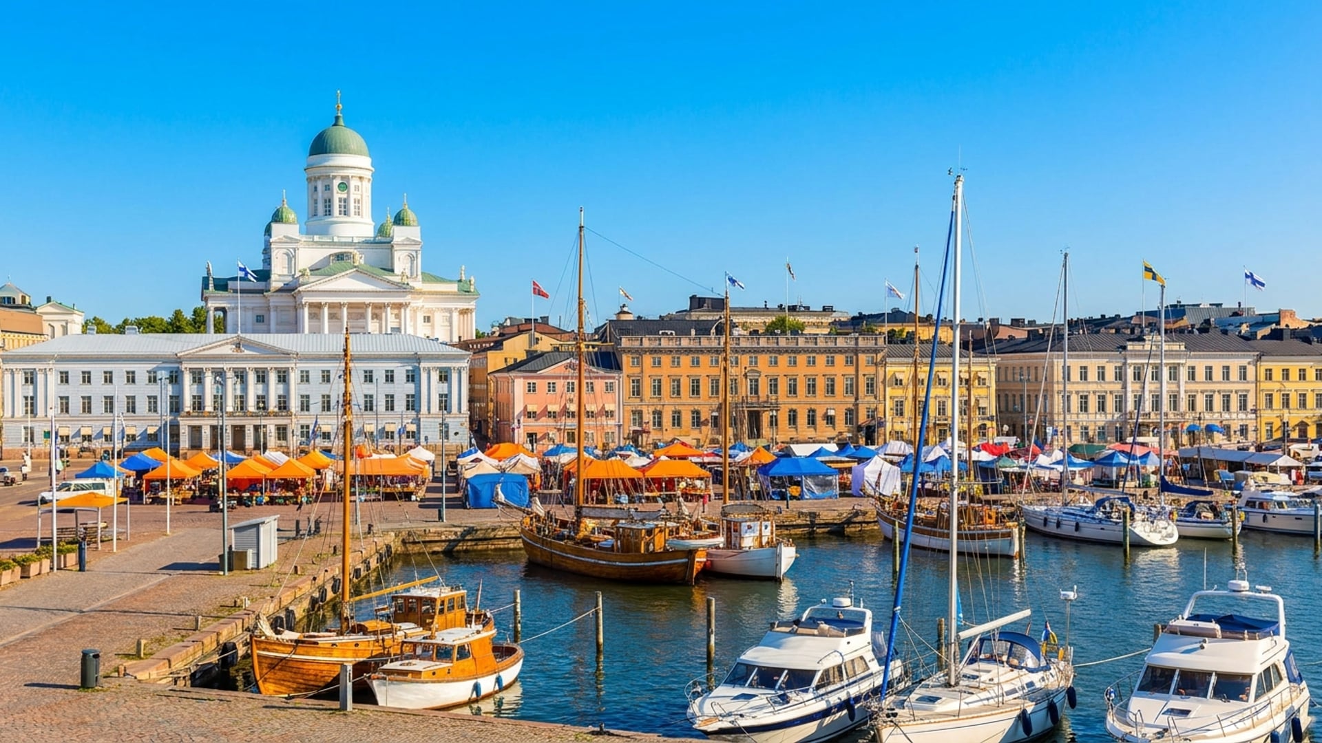 Helsinki Cathedral white building and market square on summer day